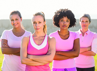 four women dressed in pink